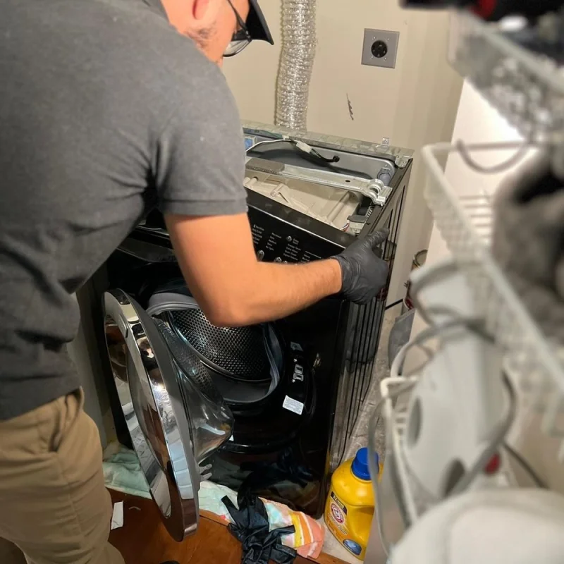 Front load washing machine heavy duty suspension spring and shock absorber replacement in Alpharetta