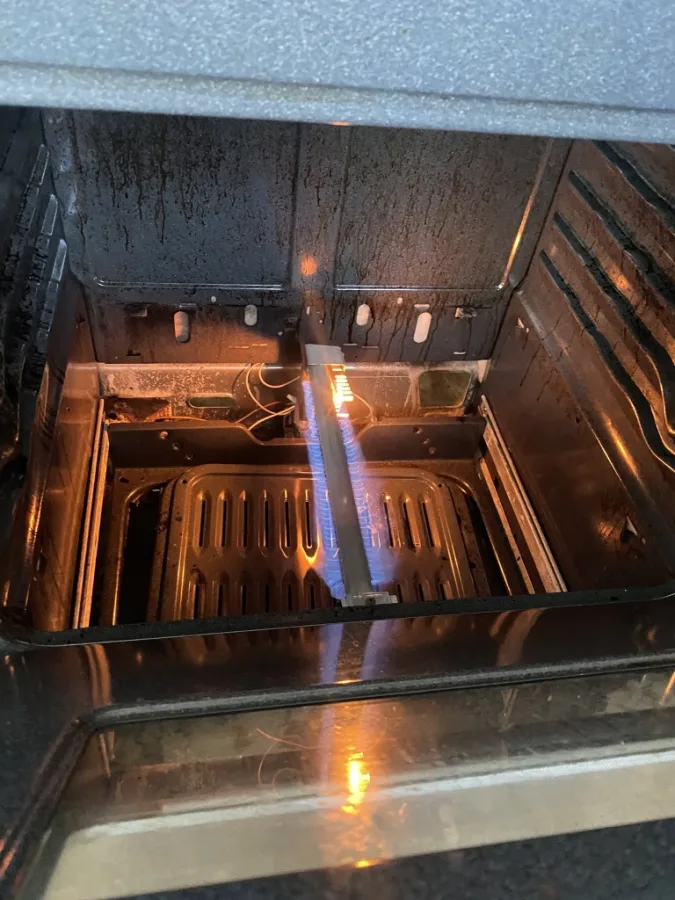Gas oven bake burner blue flame ignition and glow bar igniter operational test in Alpharetta residence